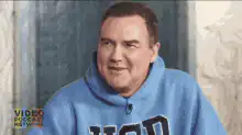 Arnold Schwarzenegger laughing