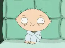 Stewie Griffin smugly sitting on a couch