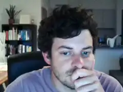 man covering mouth with hand