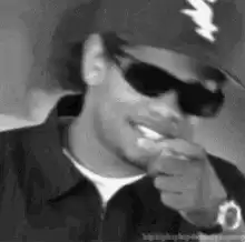 Snoop Dogg nodding and smiling
