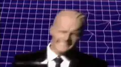 Joe Biden smiling in front of grid