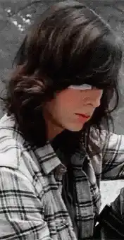 Carl Grimes looking up with eye patch