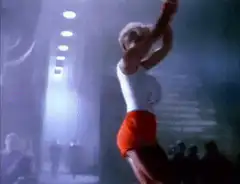 Woman on stage explodes into light
