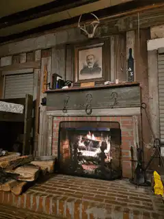 Cozy fireplace with portrait