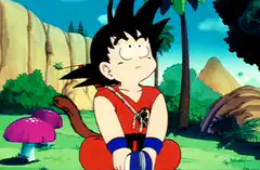 Goku sitting with a fly on his nose