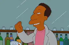 Carl Carlson gesturing at the bar