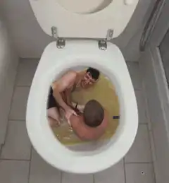Two men in a toilet bowl