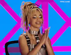 Tinashe clapping excitedly