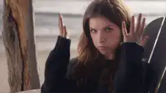 Anna Kendrick hands up then down