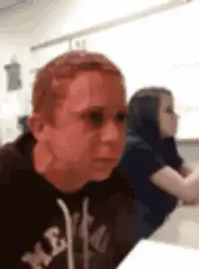 boy staring blankly in class