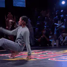 Breakdancer performs handstand freeze