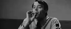 Dr. Strangelove smoking and laughing