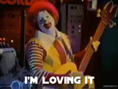 Ronald McDonald playing guitar