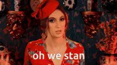 Woman in red hat says oh we stan