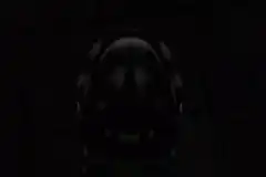 Grimace from McDonald's in the dark