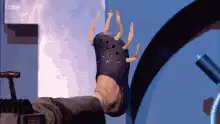 Foot in a Croc with fingers