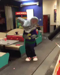 Chuck E. Cheese mascot dancing