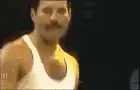 Freddie Mercury performing on stage
