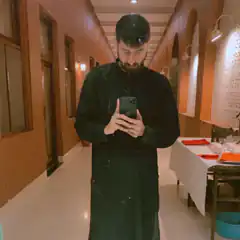 Man in black robe with snow effect