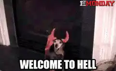 Dog in devil costume by fireplace