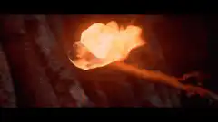 Helmet on a burning log