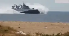 Hovercraft landing on beach