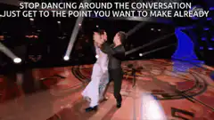 Couple dancing on stage with caption