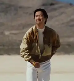 Bruce Lee in desert pointing