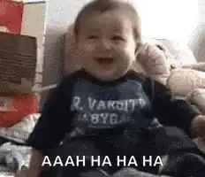Baby laughing and falling over