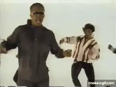 Men dancing in a white room