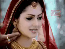 Indian bride smiling and looking away