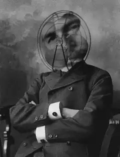 Man with spinning fan head