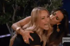 Katie and NeNe yelling and pointing