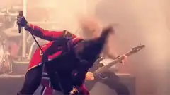 singer headbanging on stage