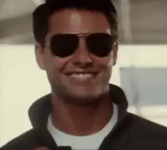 Tom Cruise takes off sunglasses Maverick