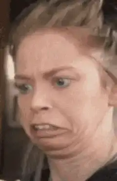 Woman making disgusted face