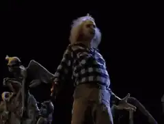 Beetlejuice dancing with gargoyle
