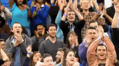 excited crowd cheering and clapping