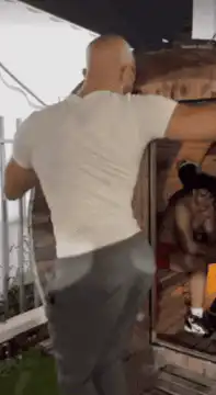 Man dances outside sauna