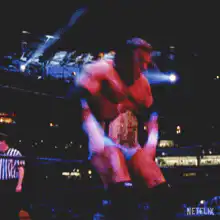 Wrestler spraying champagne in ring