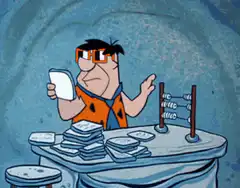 Fred Flintstone confused by abacus