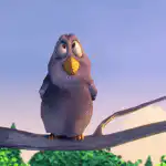 Bird singing on a branch