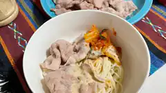 Bowl of pasta with pork and kimchi