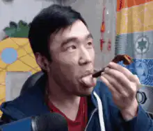 Man eating a sausage