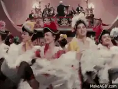 Showgirls dancers in white feather costumes