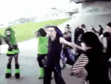 Group of people dancing outdoors