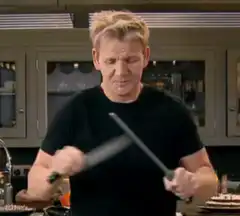 Gordon Ramsay sharpening a knife