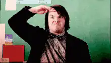 Jack Black salutes and looks proud
