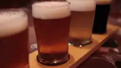 Beer flight on wooden paddle