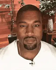 Kanye West nodding and widening eyes